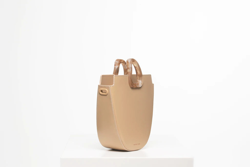 Midi flat topped oval structured oyster calf leather tote bag with natural resin round handles and a removable adjustable calf leather strap