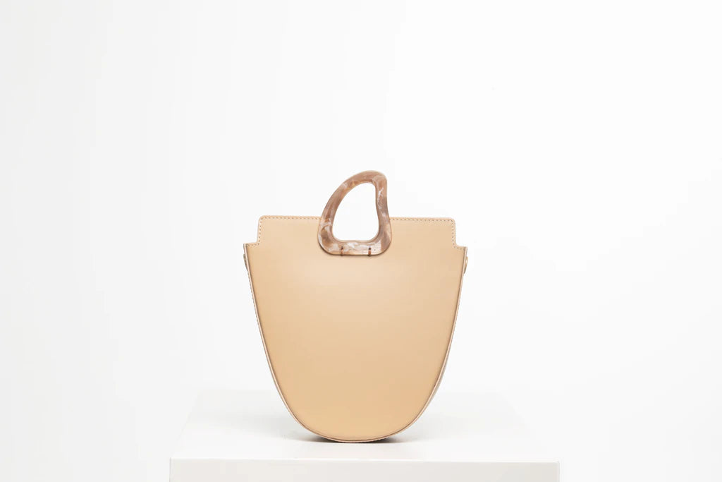 Midi flat topped oval structured oyster calf leather tote bag with natural resin round handles and a removable adjustable calf leather strap